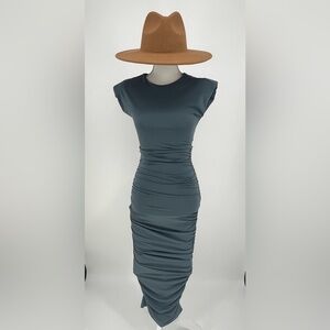 Spaghetti Strap dress. Size XS. Measurements B: 22” W: 20” L: 54”. Pre-loved.